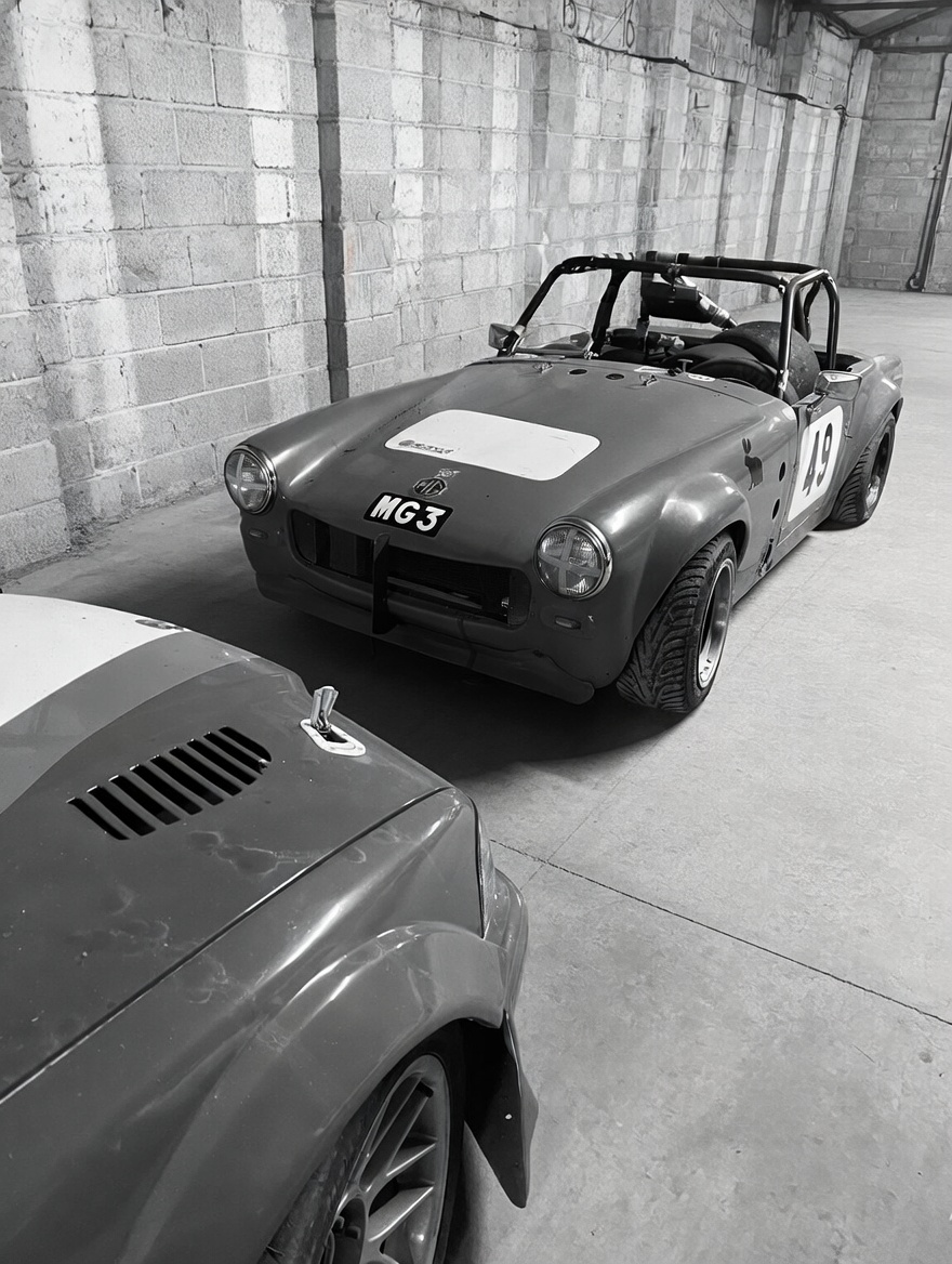 Race cars at the hangar